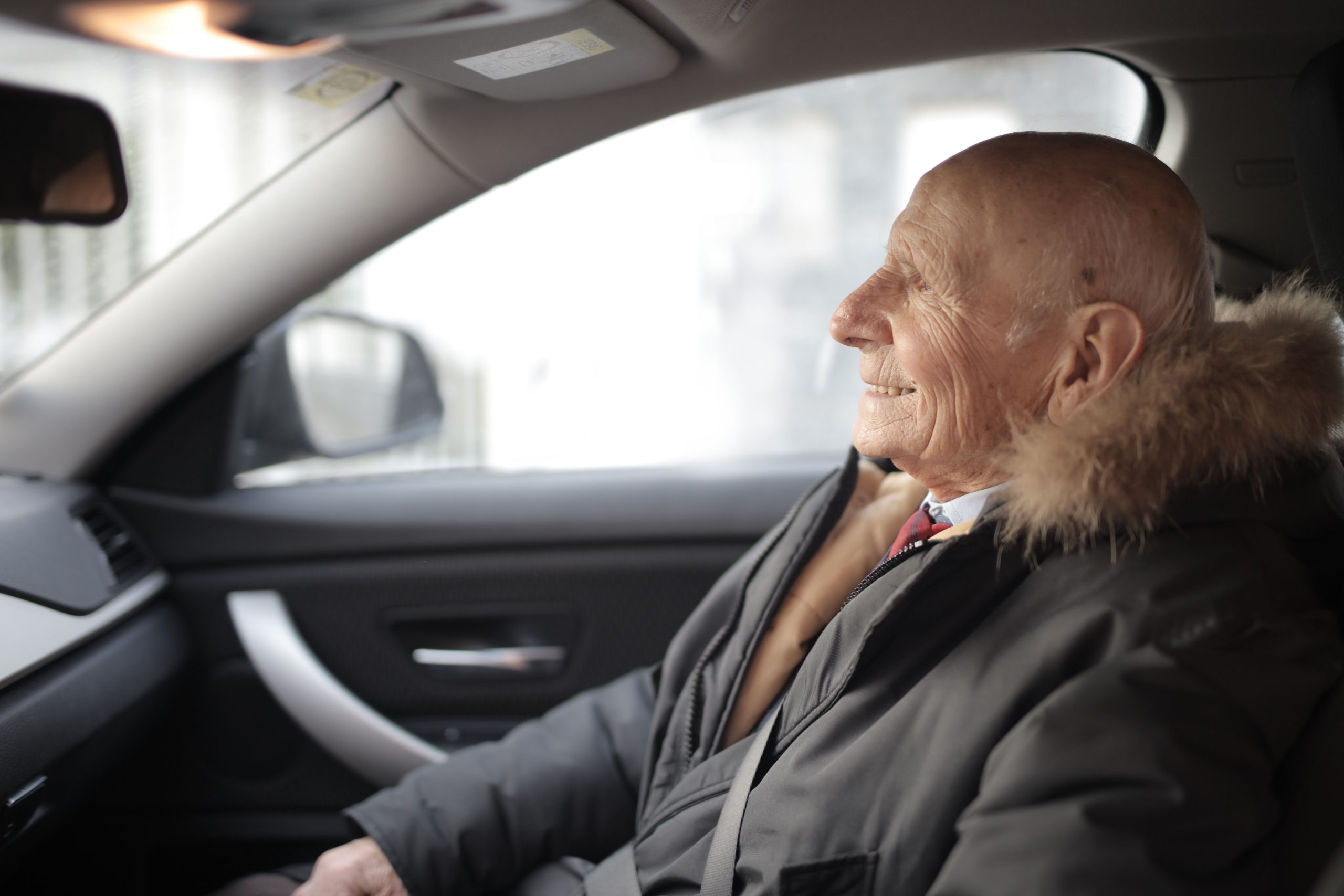happy driver in pre-warmed car Idaho Falls winter